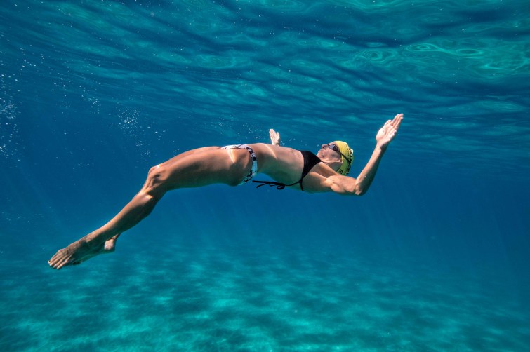 underwater-swimming-stock-by-Mike-Lewis-2
